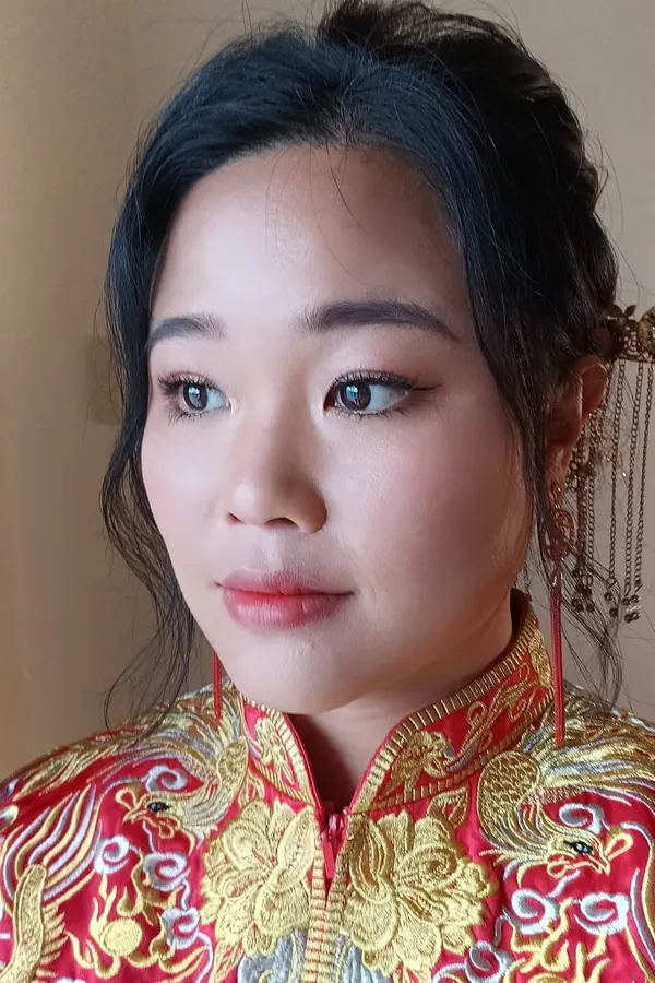 Qun Kua bridal makeup close-up with soft brows and rosy lips by THEENG, Kuantan