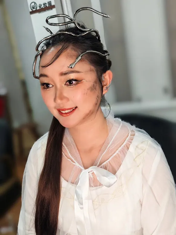 Creative theme makeup with painted scales and snake crown, by THEENG, makeup artist in Kuantan