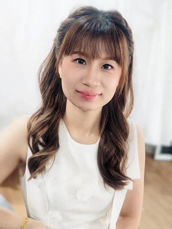 Korean-style natural makeup with see-through fringe and soft curls by THEENG in Kuantan
