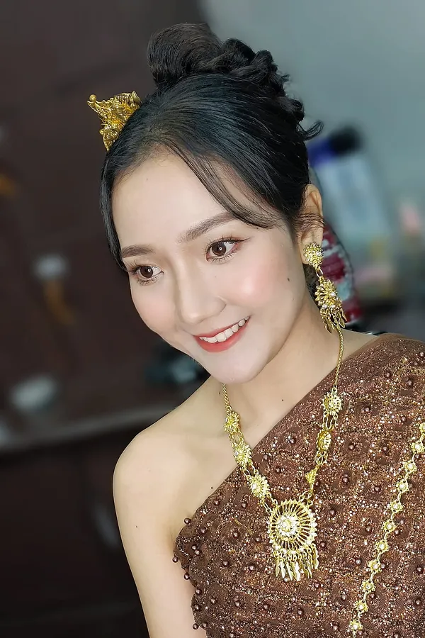 Smiling portrait in Thai traditional costume with gold headpiece, photoshoot makeup by THEENG, Kuantan
