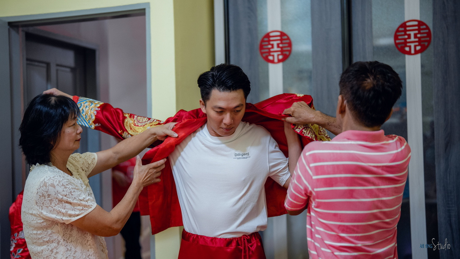 Wuh Hou & Sze Minn groom preparation photography, natural movement frame 13, by Famous Bridal Kuantan