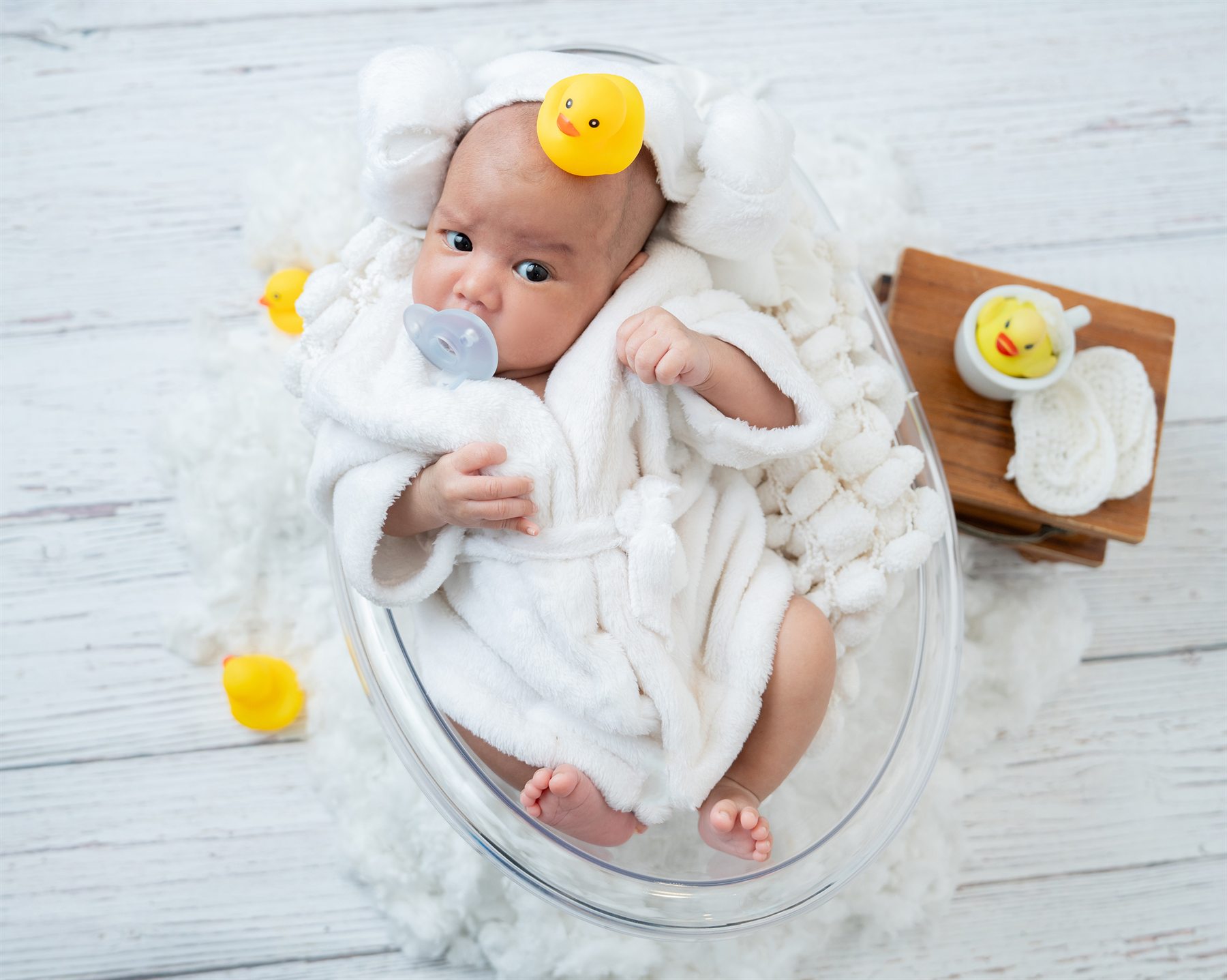 Newborn photography by Famous Bridal, baby bath theme portrait with yellow duck props