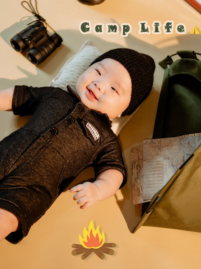 One-year baby studio portrait with themed props