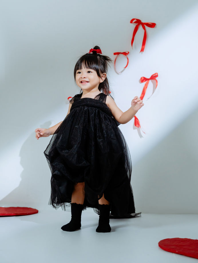 Toddler princess costume portrait with studio props