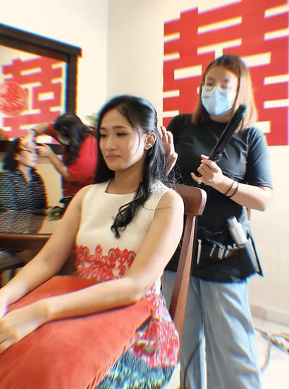 THEENG bridal makeup artist in Kuantan with elegant wedding hairdo